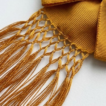 Moño corbatín charro dorado unitalla